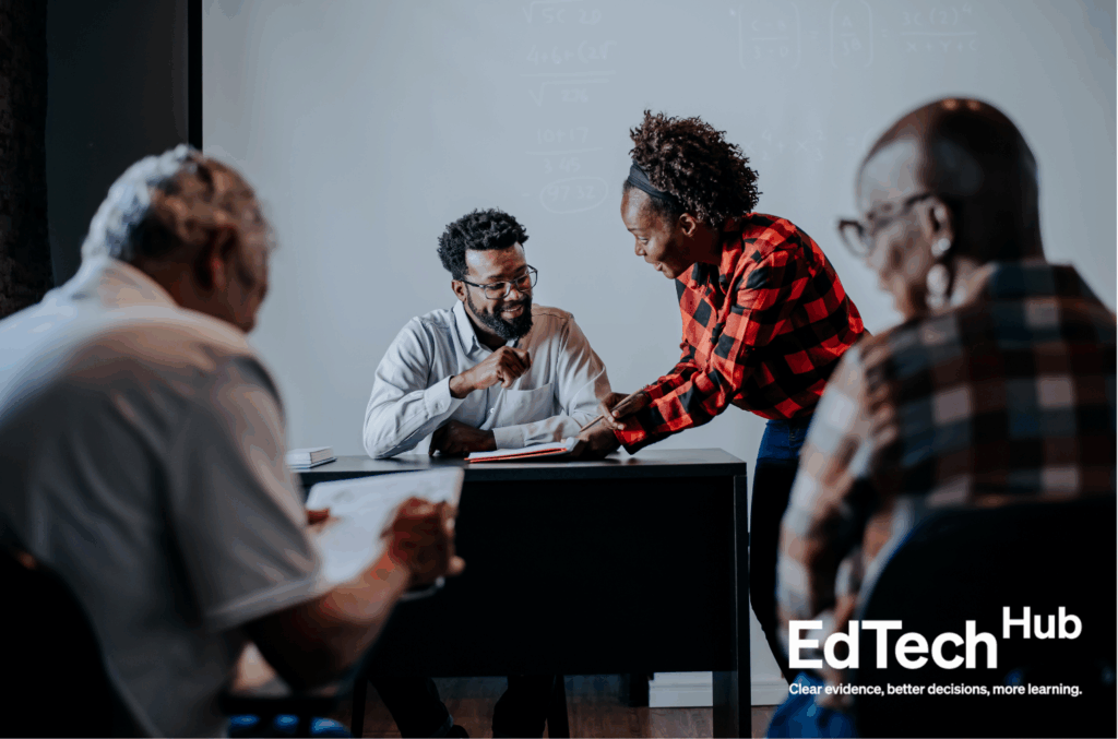 Header showing people at an event engaging with each other for blog: Six Takeaways from the Distance Education and Teacher Training in Africa (DETA) 2025 Conference